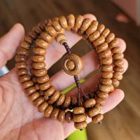 Sechs Disc Holz Buddhistische Perlen Armband, buddhistischer Schmuck, Sienaerde gelb, 5x10mm, verkauft von Strang