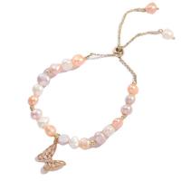 Kultivierten Süßwasser Perle Messing Armband, Natürliche kultivierte Süßwasserperlen, mit Messing, Schmetterling, 14 K vergoldet, Einstellbar & Modeschmuck & Micro pave Zirkonia & für Frau, Rosa, 15x15mm, Länge:ca. 24 cm, verkauft von PC