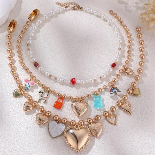 collier d'Émail en alliage Zinc, alliage de zinc, avec Plastique ABS perle, Placage de couleur d'or, bijoux de mode & modèles différents pour le choix & émail, plus de couleurs à choisir, Vendu par PC