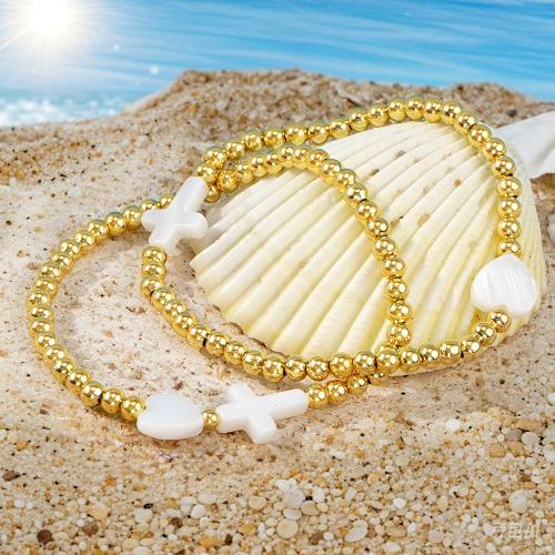 Bracelets en acier inoxydable, Acier inoxydable 304, avec coquille, coeur, Placage de couleur d'or, 2 pièces & pour femme, Vendu par fixé