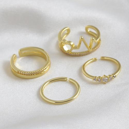 Zircon pavent l'anneau en laiton de doigt, Placage de couleur d'or, styles différents pour le choix & pavé de micro zircon & pour femme, Vendu par PC