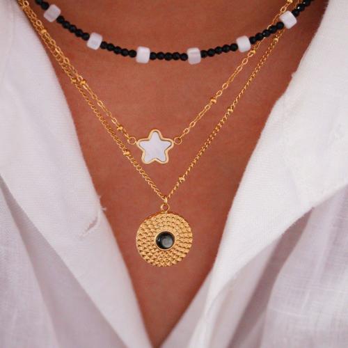 Acier titane Collier et bracelet, avec coquille noire & coquille blanche, Placage de couleur d'or, styles différents pour le choix & pour femme, Vendu par PC