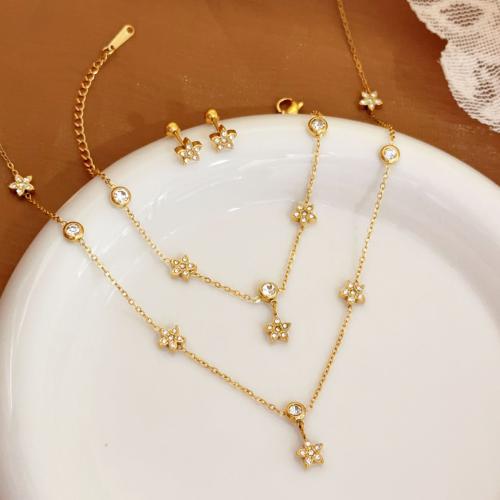 Acier inoxydable 304 Collier et bracelet, fleur, Placage de couleur d'or, chaîne ovale & styles différents pour le choix & pour femme & avec strass, Vendu par PC