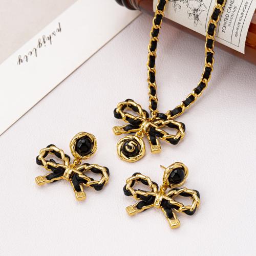 Alliage de cuivre parure de bijoux, avec cuir PU, Noeud papillon, Placage de couleur d'or, styles différents pour le choix & pour femme, Vendu par PC