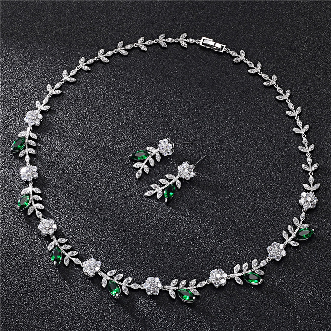 5 real platinum plated with green CZ