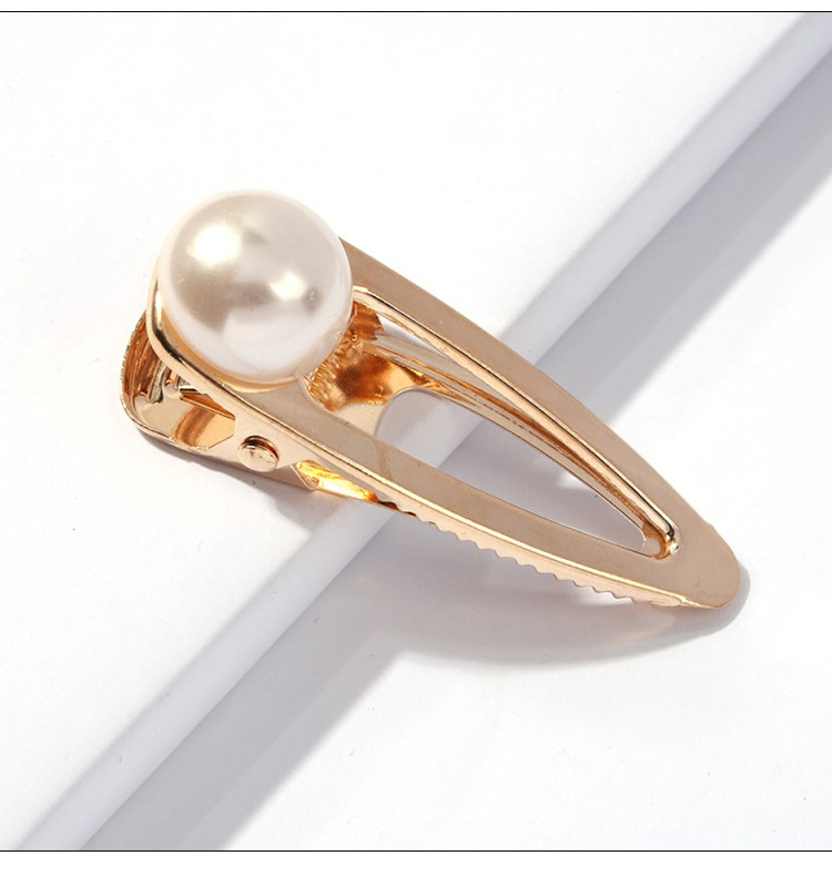 F0187-Triangle golden big pearl