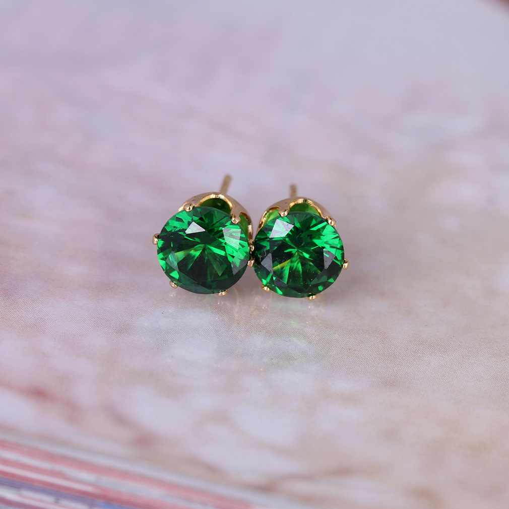 yellow gold: green Zircon