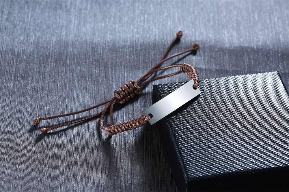 Steel color curved card + brown rope