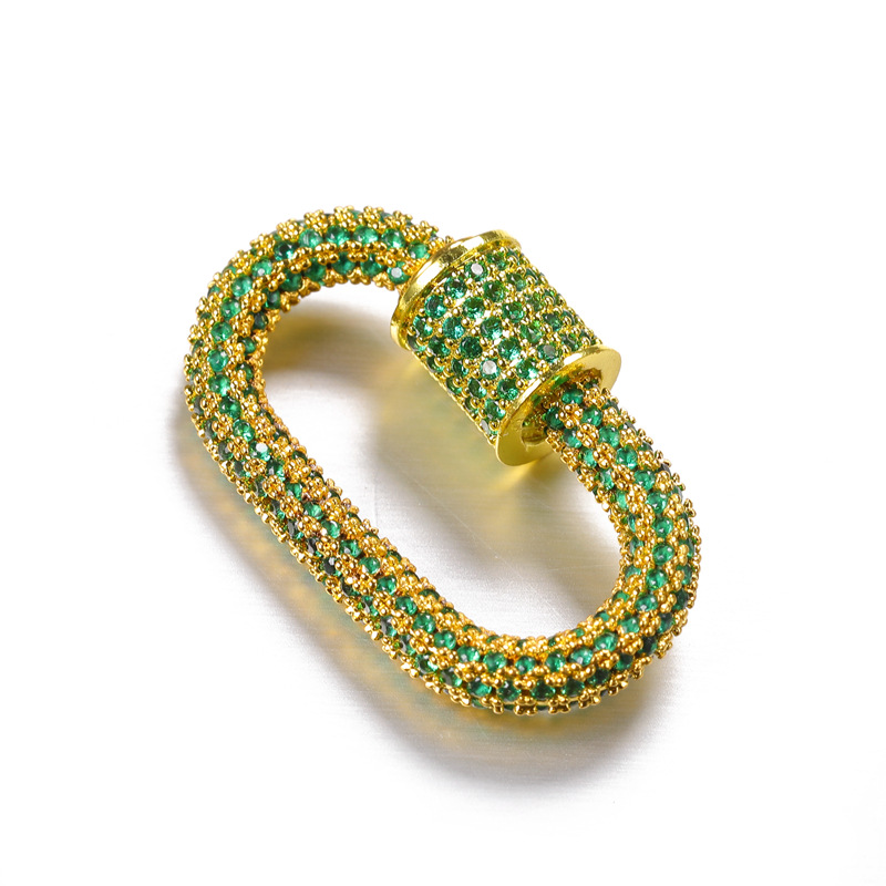 gold plated with green rhinestone