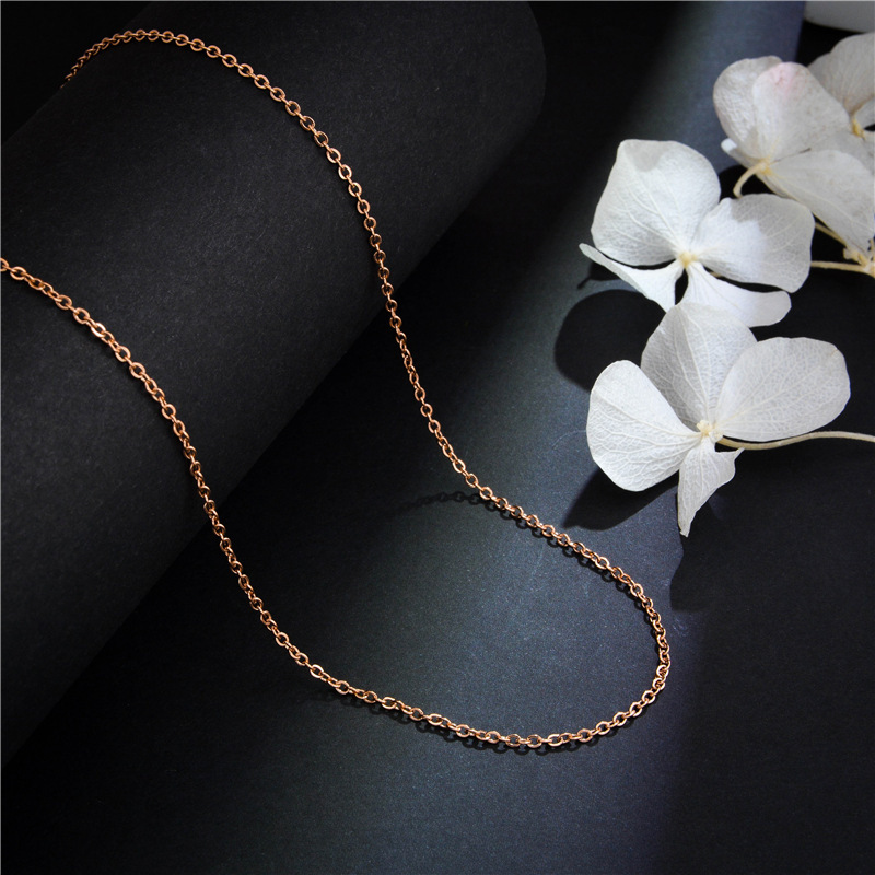 Cross chain rose gold