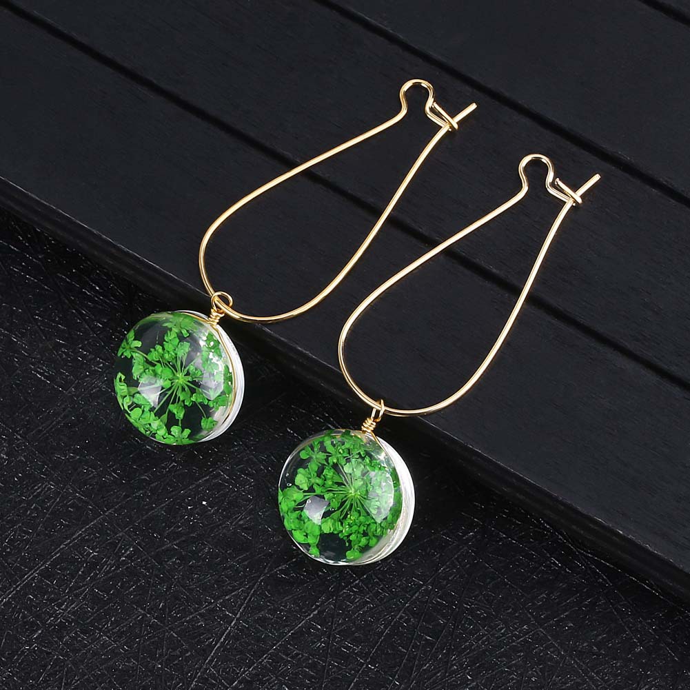 Gold ear hook green