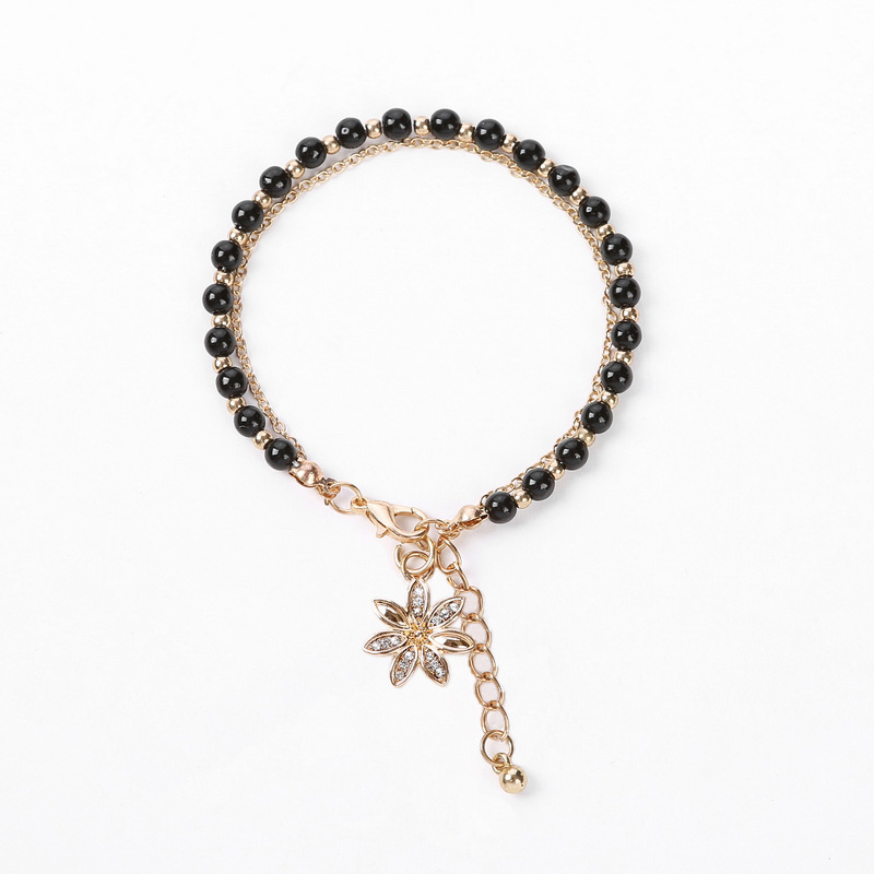 Black bead chain + flower pendant