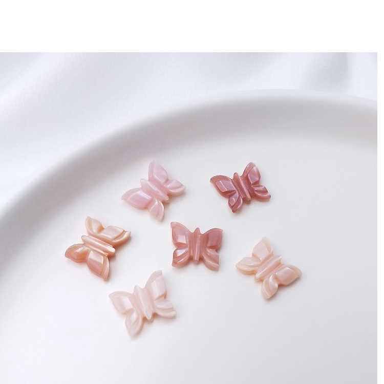 Pink shell trumpet butterfly 11x9mm_1 pcs