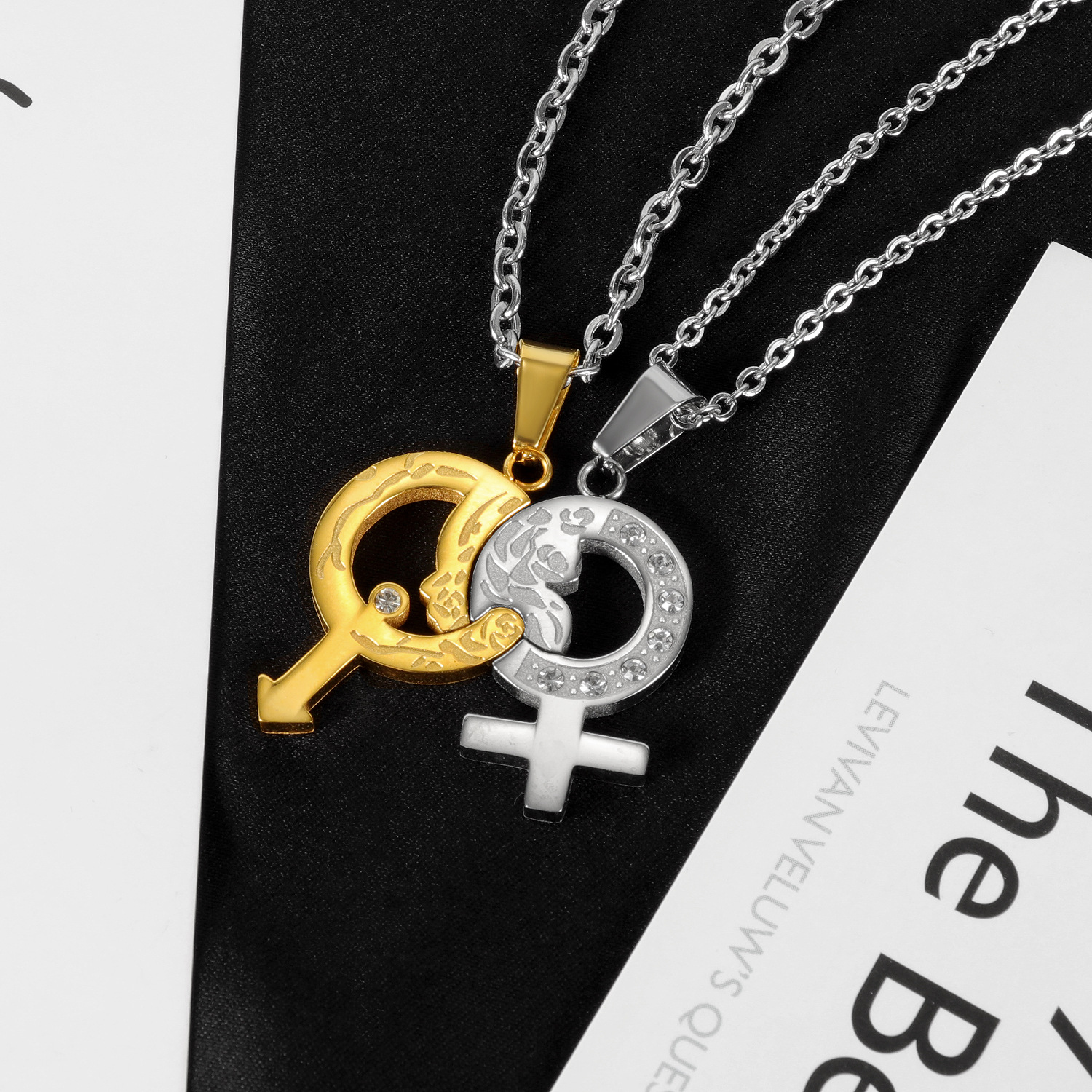 Between gold pendant necklace