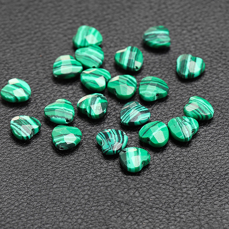 Synthetic malachite cut face love 10*5mm/20 or so