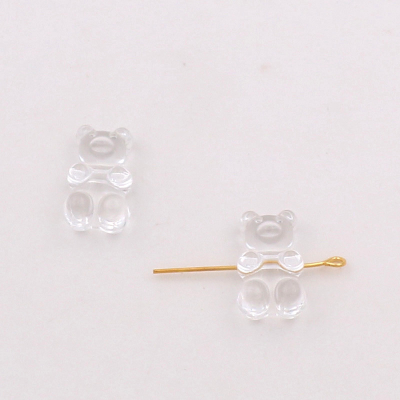 Transparent cross hole bear channeling bead