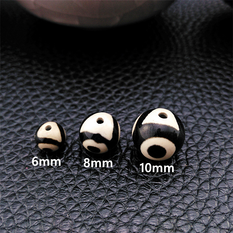 Three eyes round beads 8MM