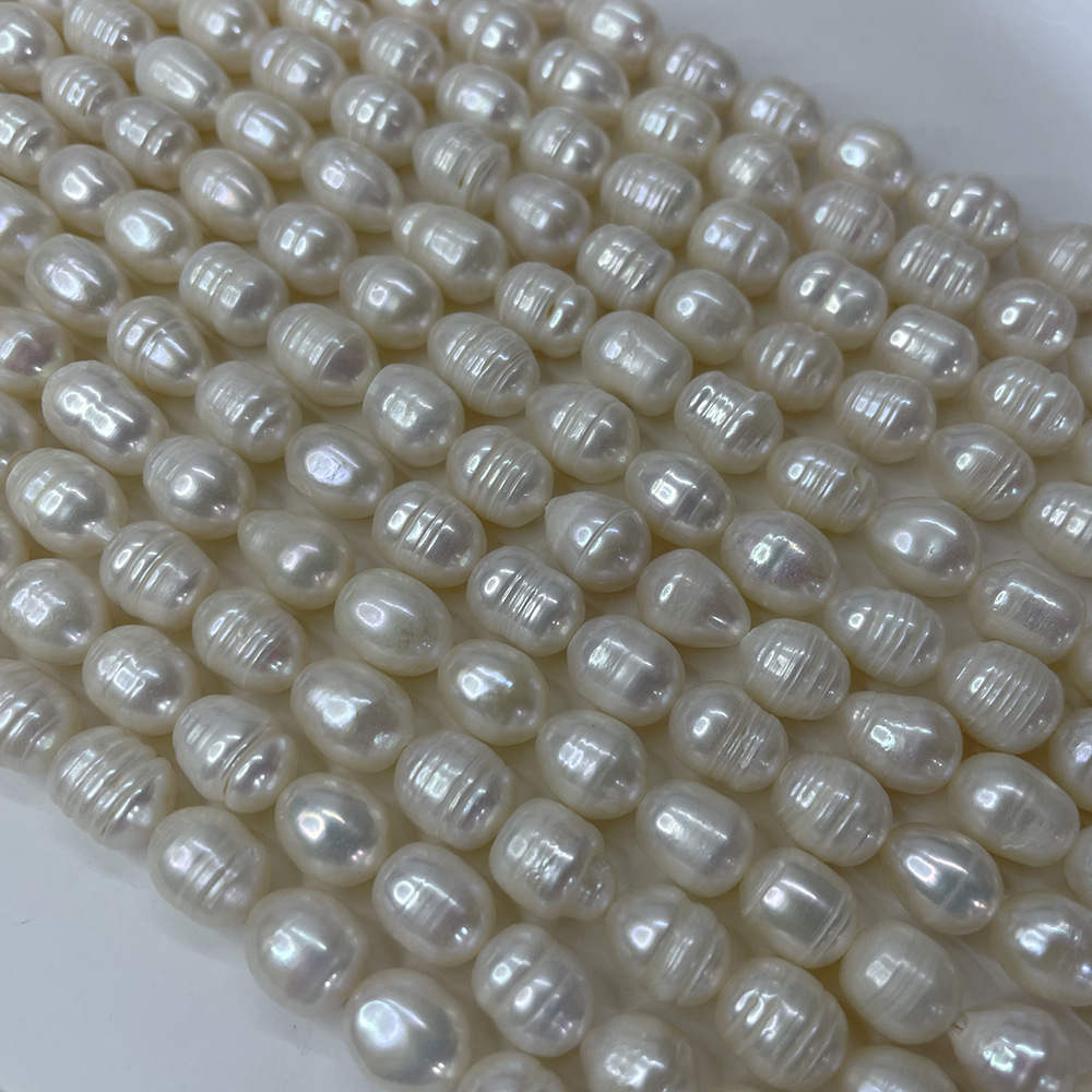 White threaded beads, about 33  beads/strand, 9-10