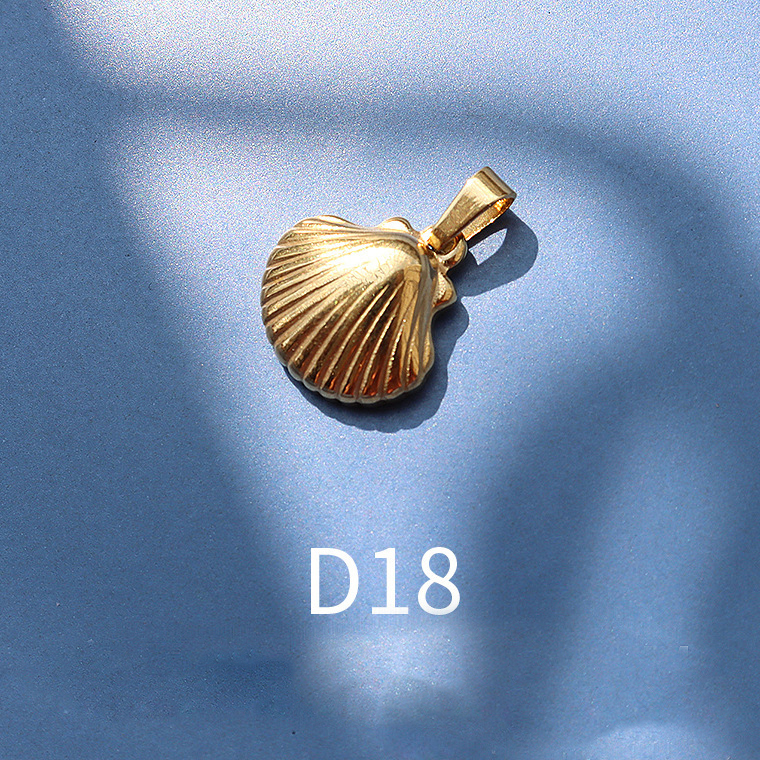 D18 golden shell large 1.5x1.6cm