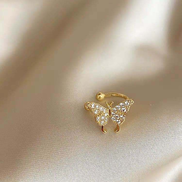 5:5# One golden butterfly ear clip