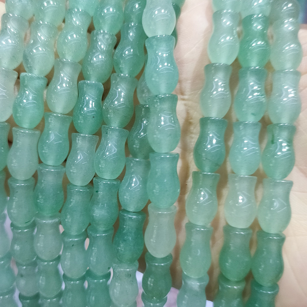 Green aventurine in vase