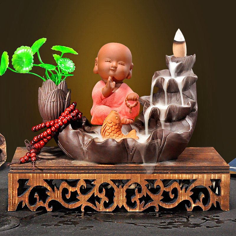 18:Hollow wooden base   fish playing in lotus pond   little monk praying