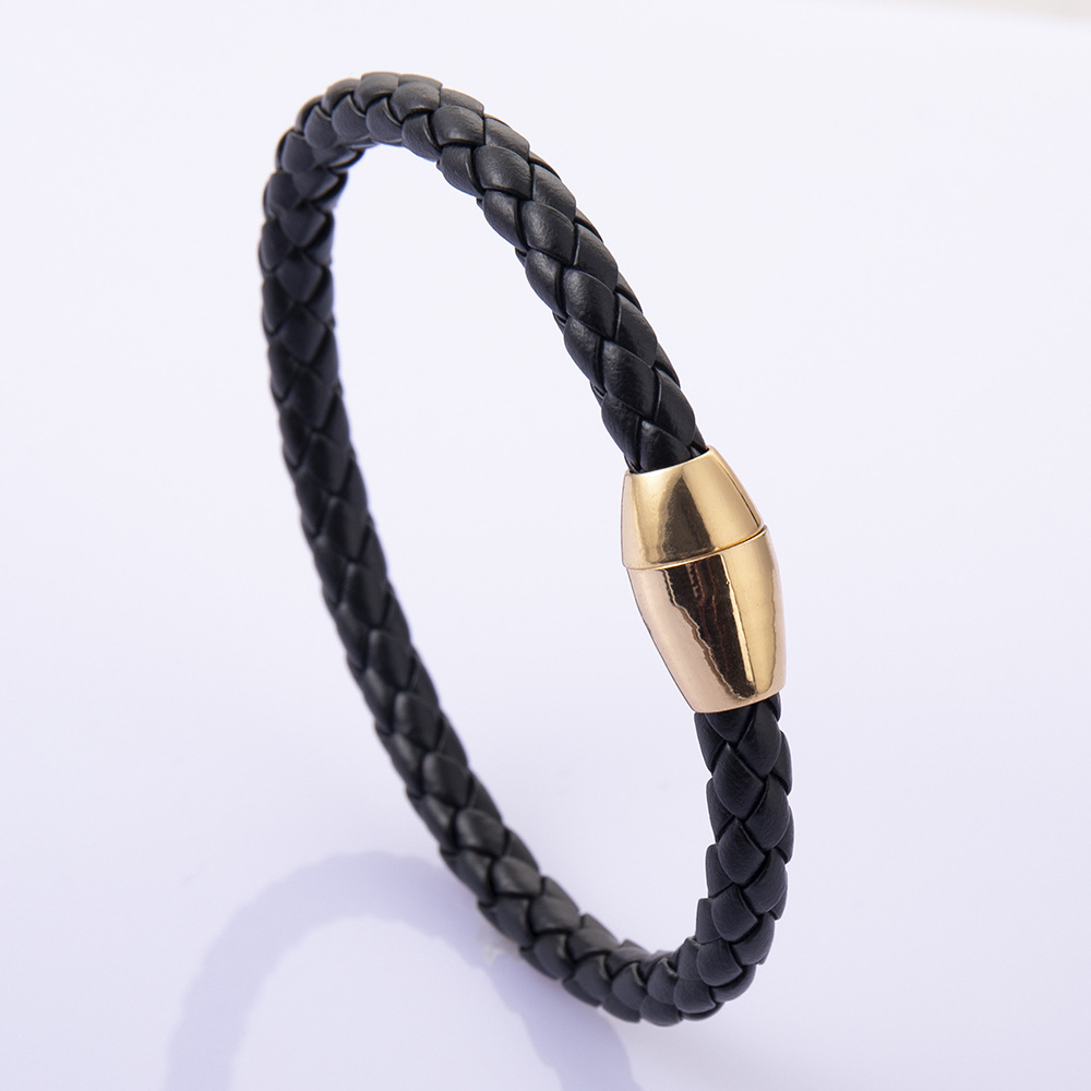 Gold buckle + black rope