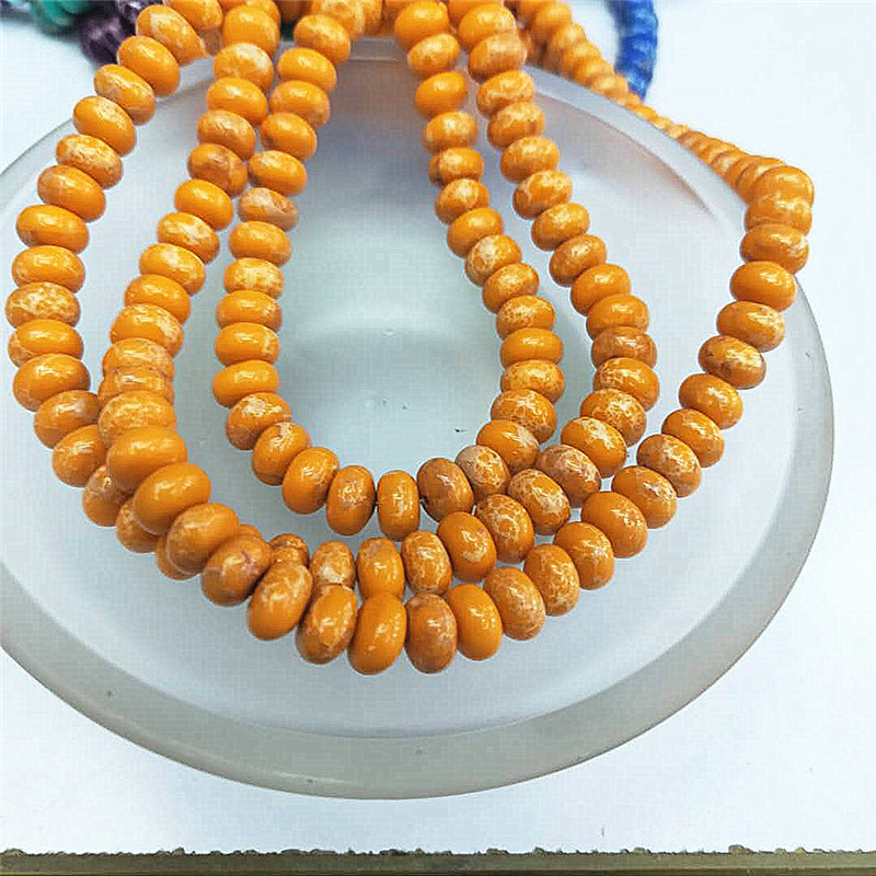 Orange with flower 4*6mm (83 pieces/strand)