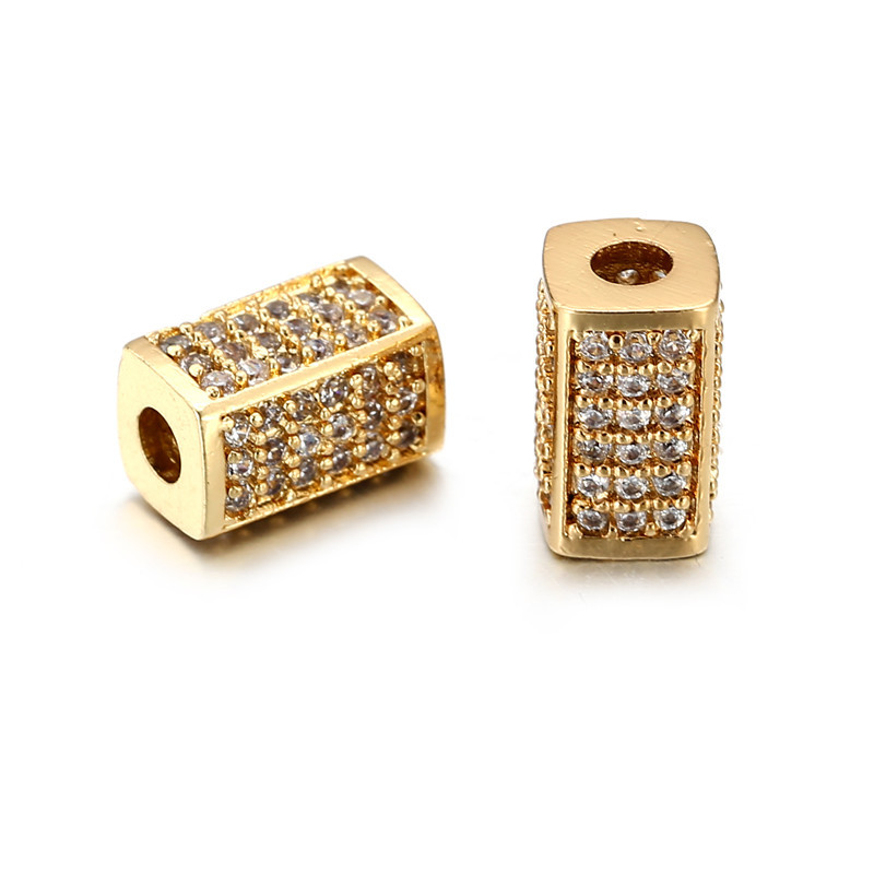 Golden, white cubic zirconia