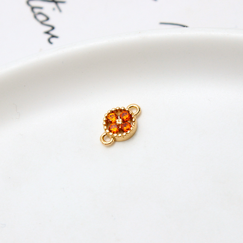 Orange four-leaf flower 6x10mm