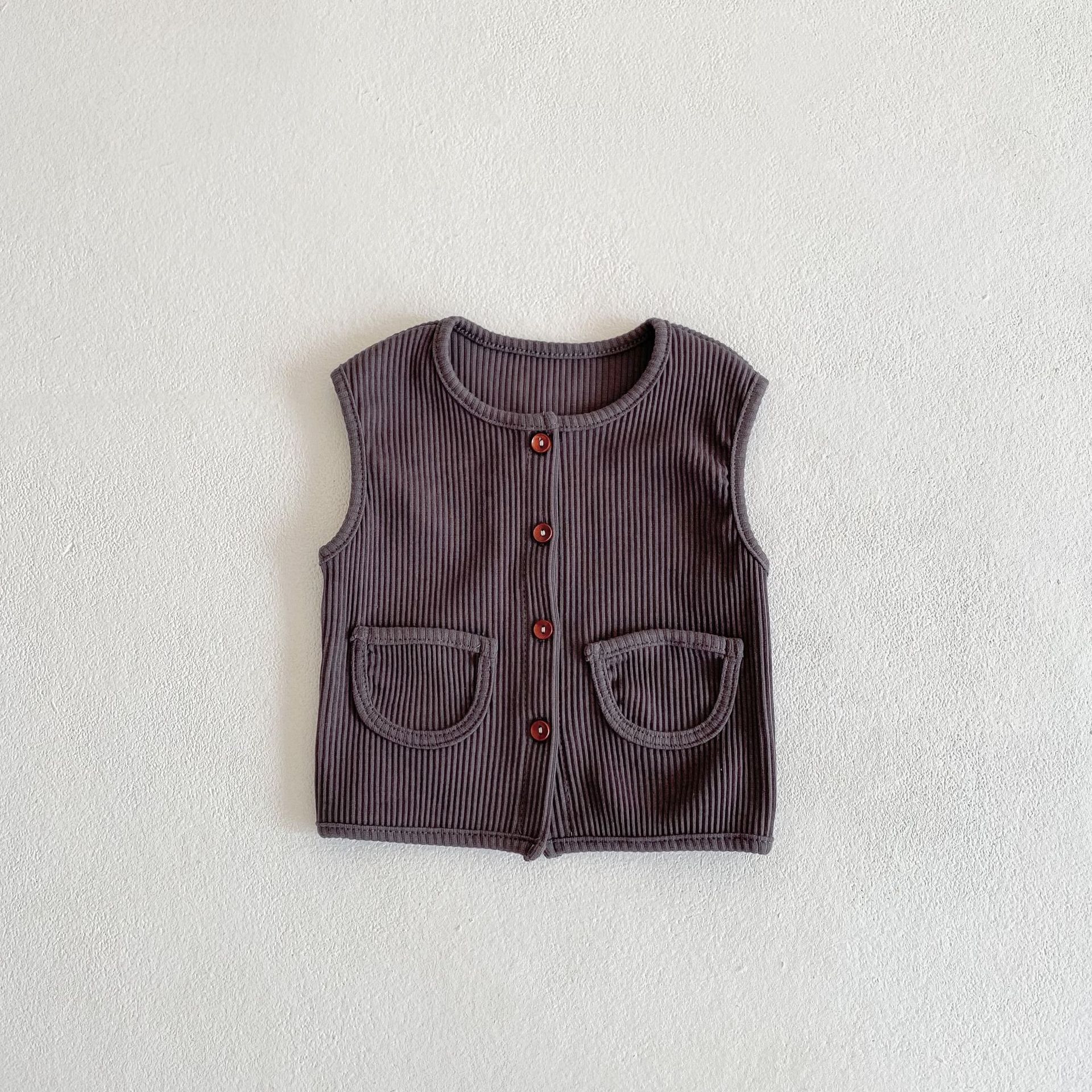 dark grey vest