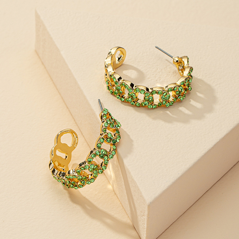 2 gold color plated with green rhinestone