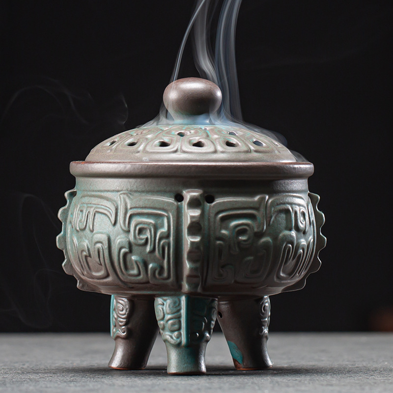 Three-legged incense burner with ancient pattern -