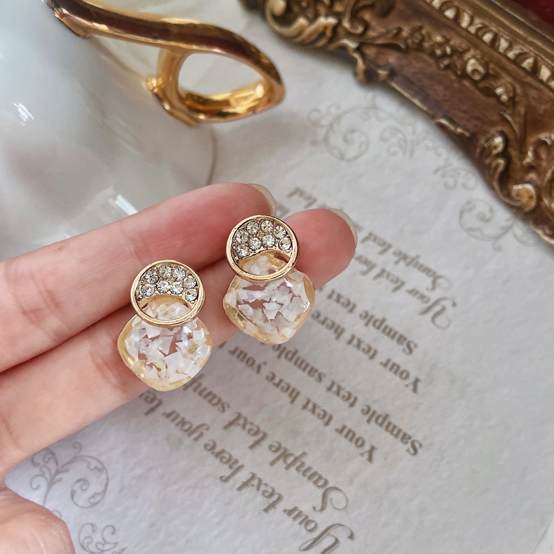 White Bell Ear Clip