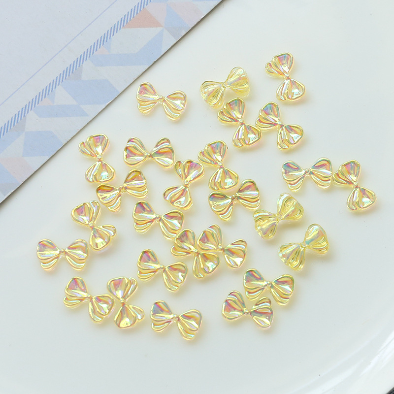 8:8# Magic yellow bow 11x6mm