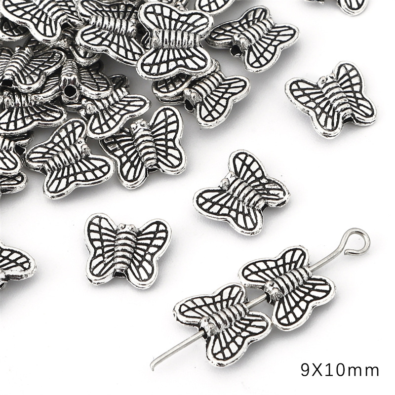 8:Butterflies 9x10mm 40 / pack