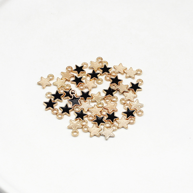 3# Small black star 8.5x6.5mm