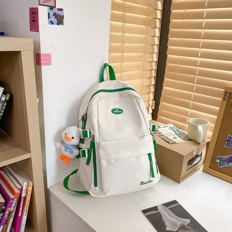 white and green with hanging ornament