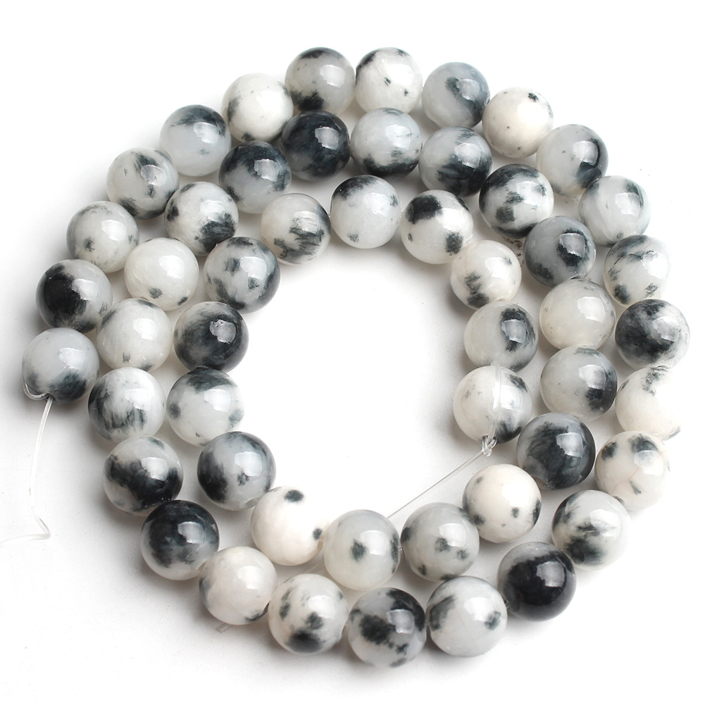 Black + white colored jade 6mm