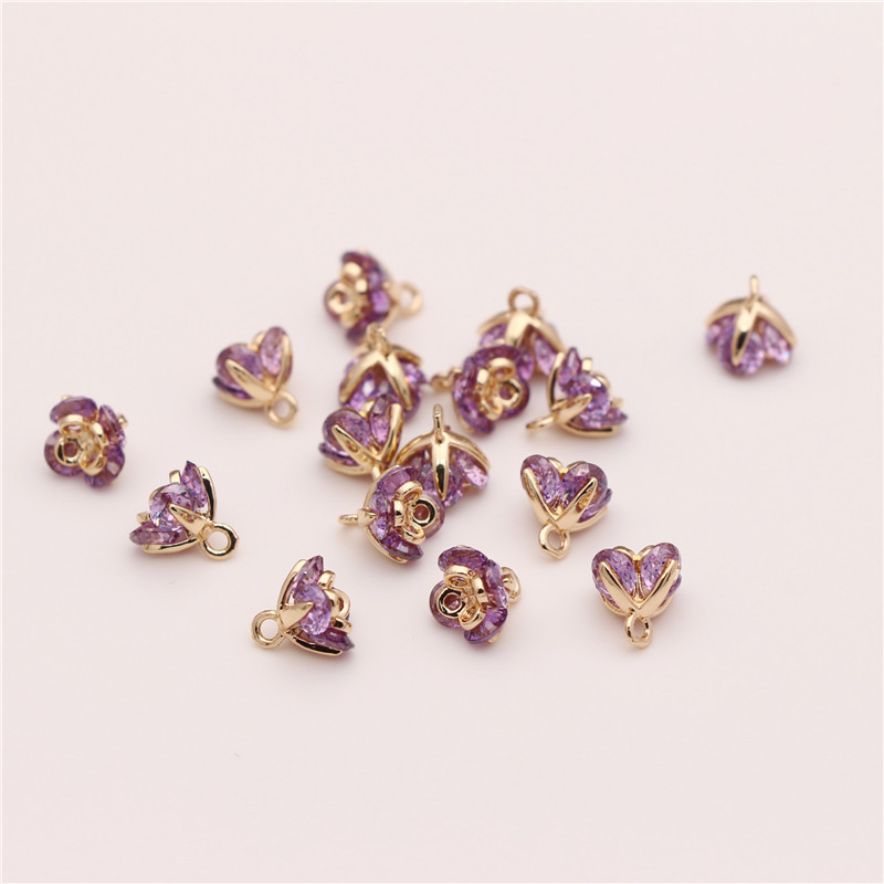 gold plated with purple CZ