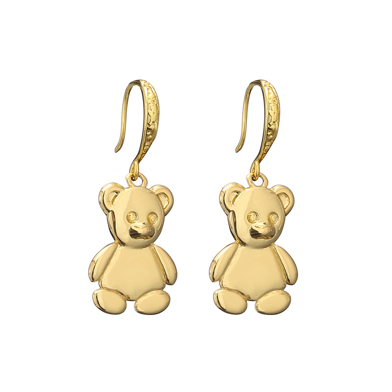 A pair of gold earrings