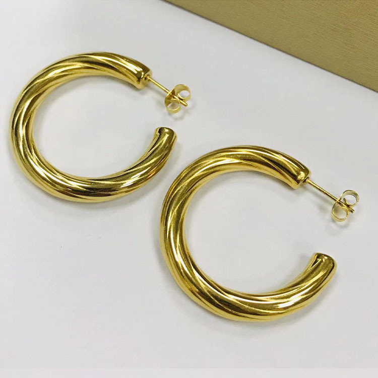 1:35MM gold ear pins