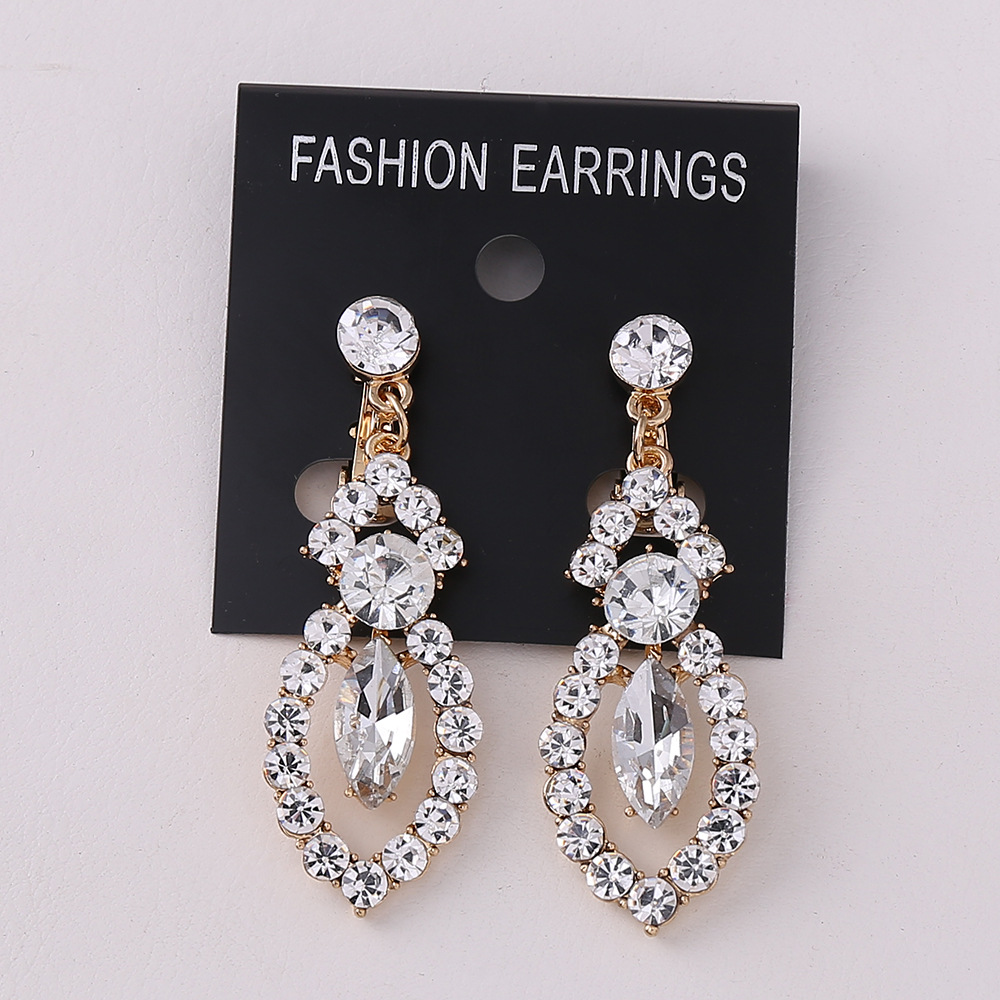 KC Golden White Diamond Ear Clip