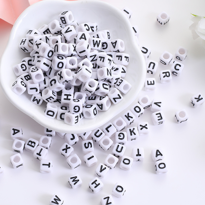 Black letters on white background 7*7mm about 1950