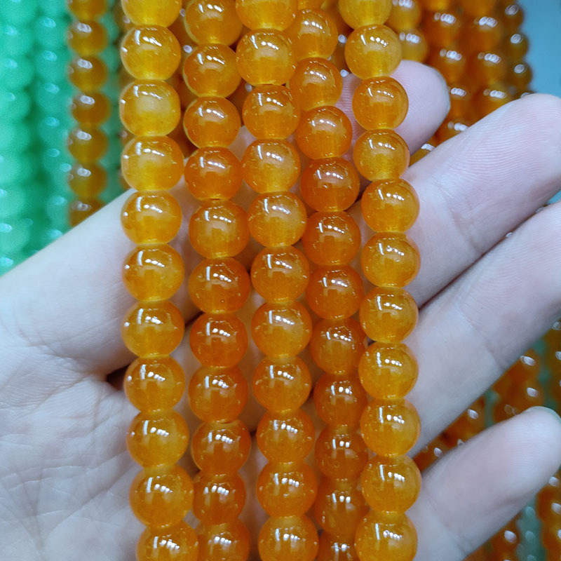 orange 6mm about 140 pieces / string