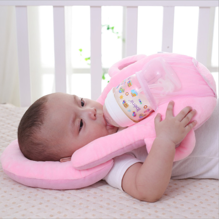 Pink feeding pillow