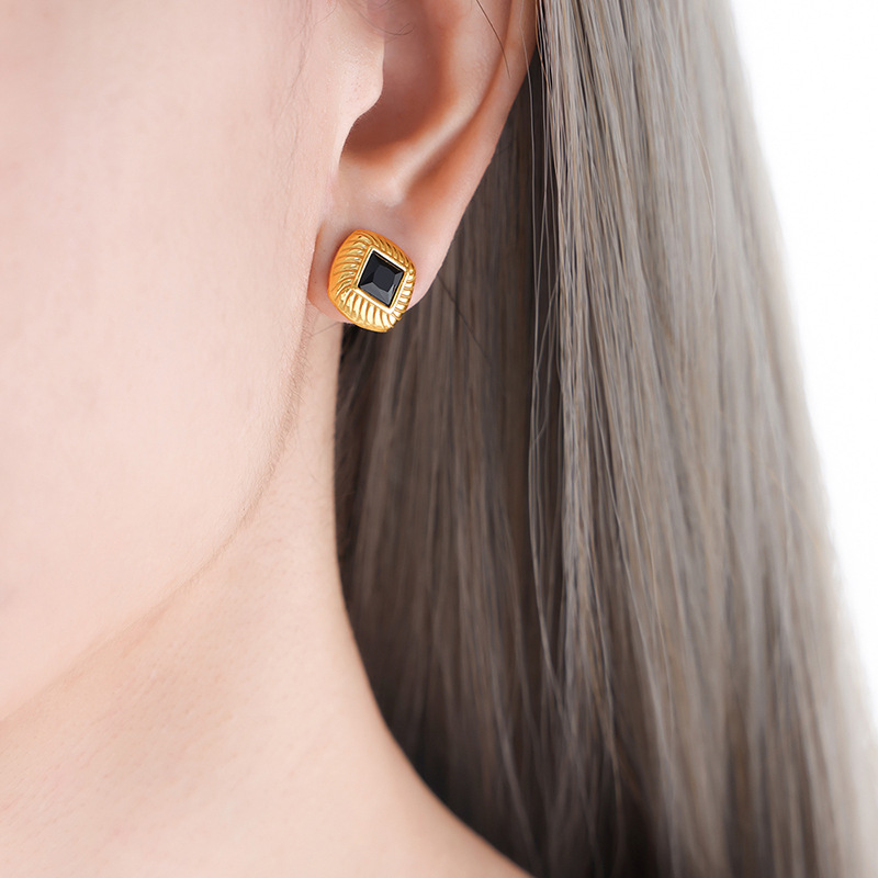 Gold black glass stone earrings