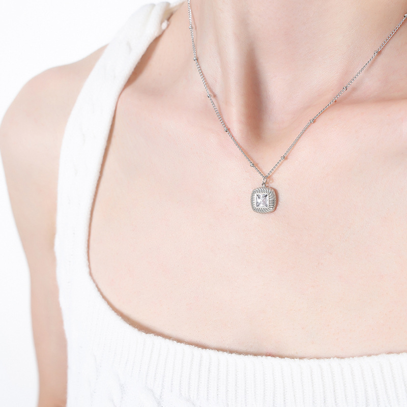 Steel color white zircon necklace