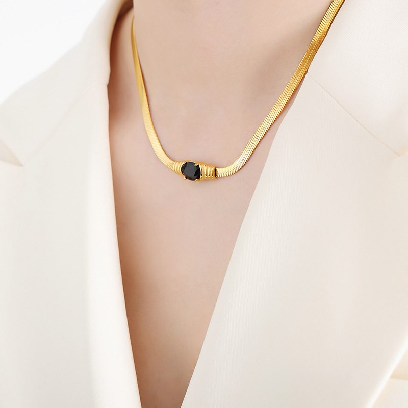 Gold black glass stone necklace