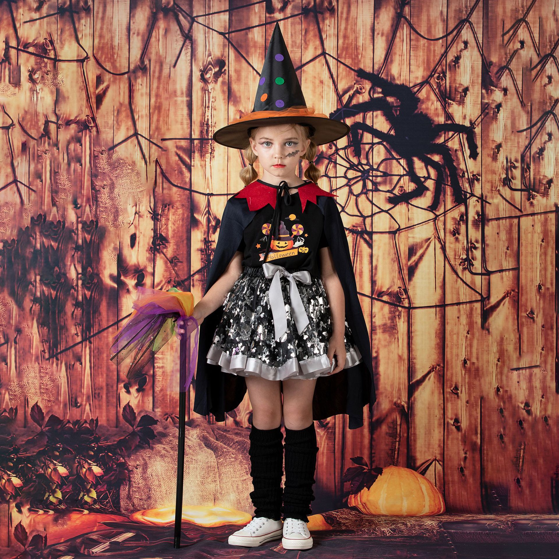 Skirt   cloak   witch hat   broom